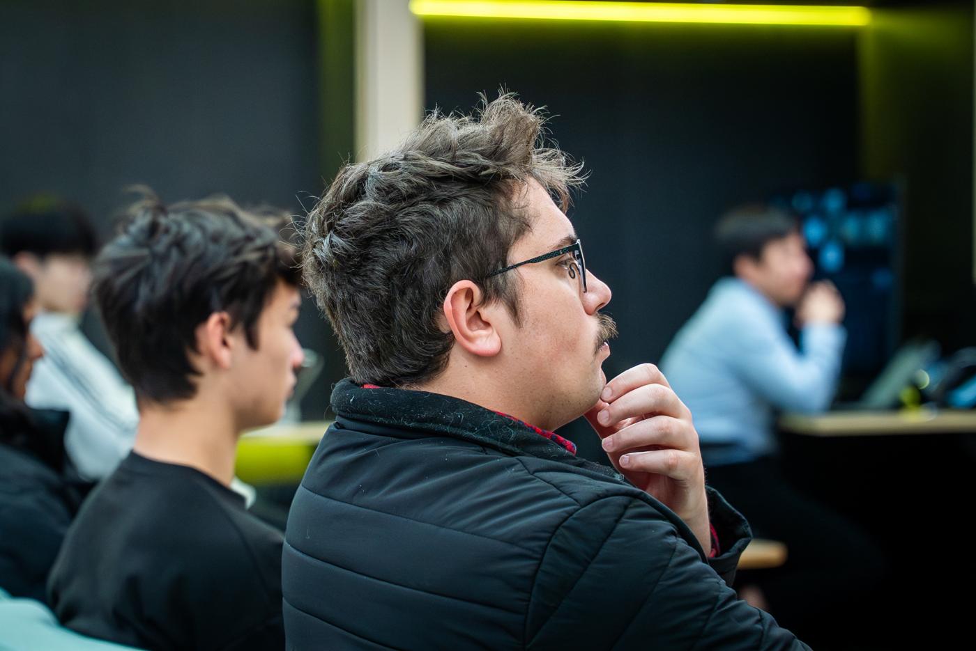 A student thinking during a session